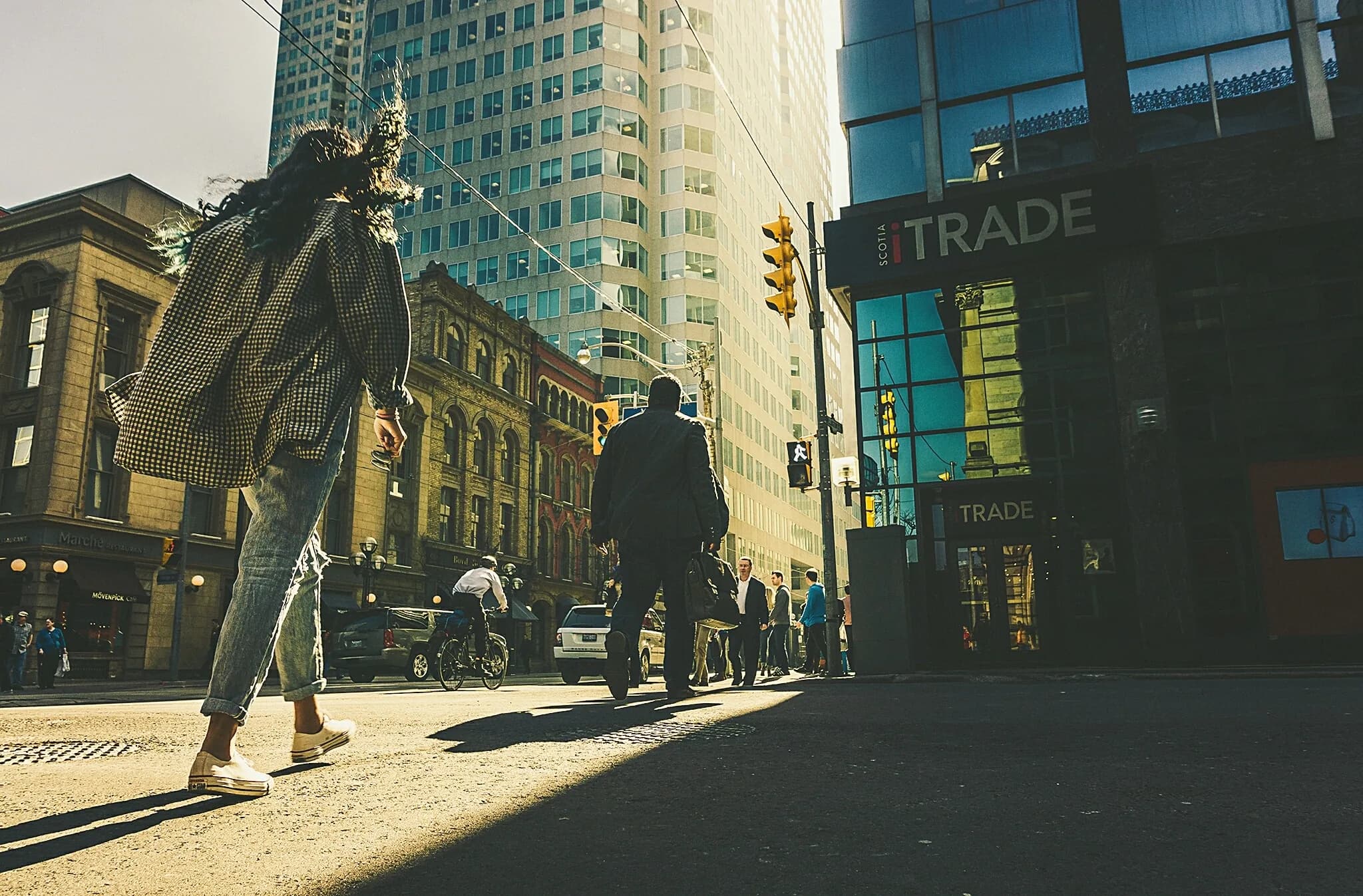 People walking through Toronto's financial district